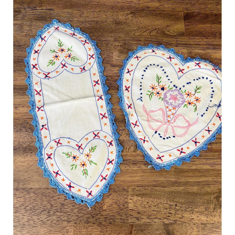 Two embroidered doilies crochet edge lace hearts linens